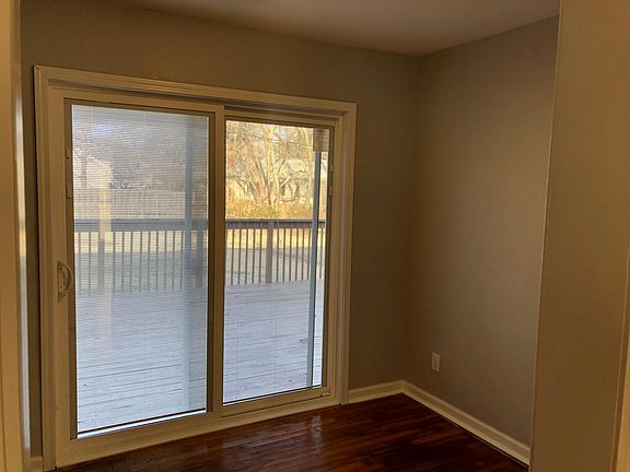 Extra room that had laundry hookups and opens up to deck and back yard