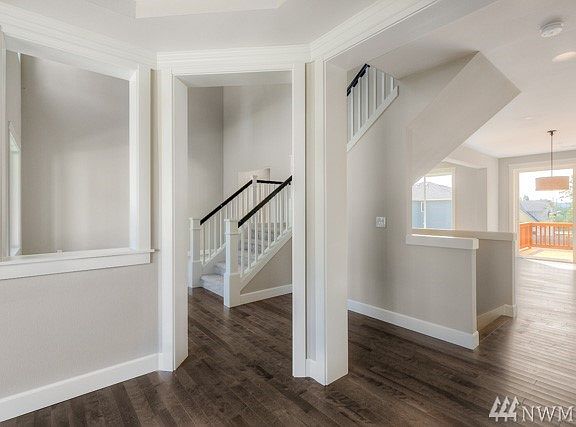 Hampton 4438 sf plan , elevation A ( Lot 8) is under construction, this photo is of another home and floorplan in a different community.  This photo is to be viewed as a sample of the different exterior colors, designs, details and finishes.