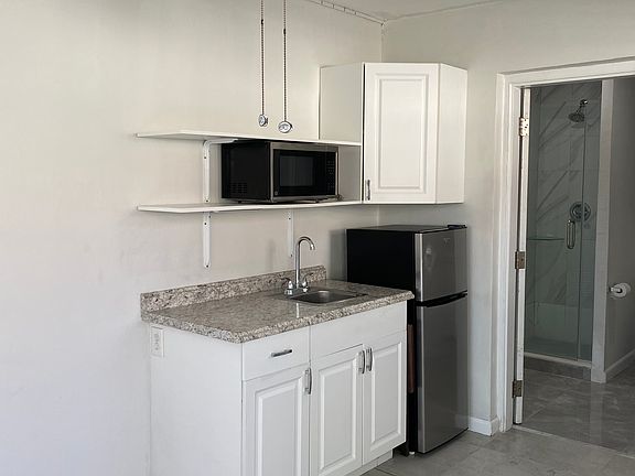 Kitchenette within the main area.