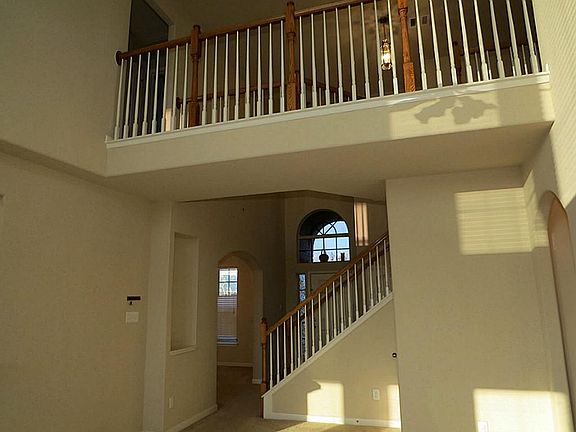 What a view of the staircase and 2nd level bridge.