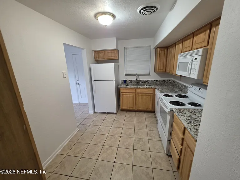 11428 Harlan Dr — Photo 10