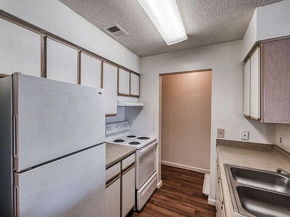 Kitchen with all white appliances