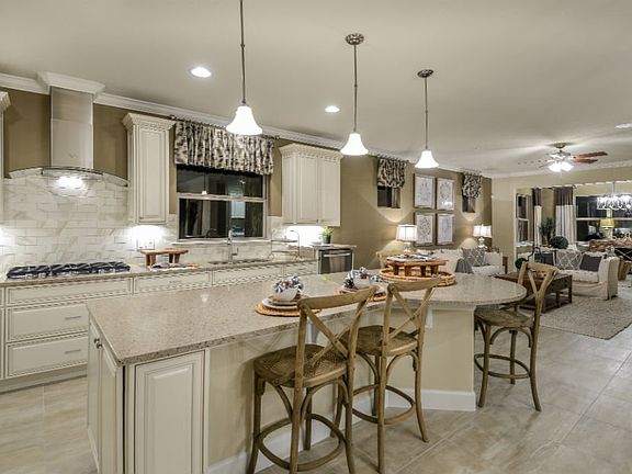 Kitchen with Timeless / Calcutta Pearl Wall Tile and optional Quartz Countertops