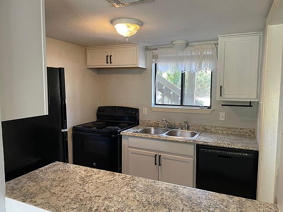3rd image of 15919 Golf Club Dr APT 114