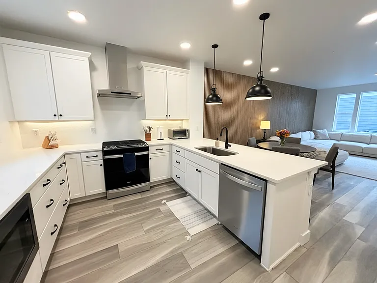 Kitchen backsplash has been installed since picture was taken.