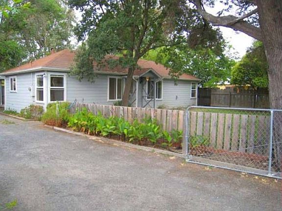 Fenced driveway & yard