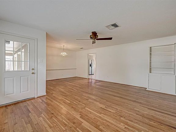 Large main room with beautiful oak hardwoods.