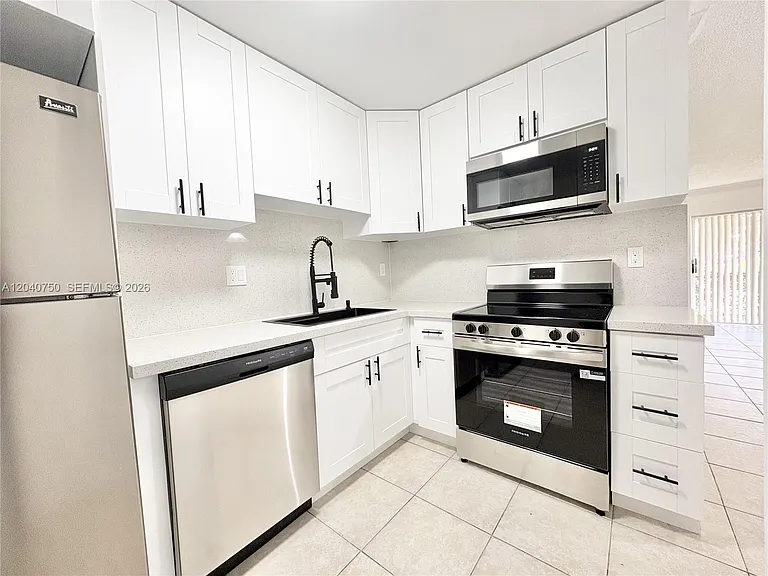 104 Gardens Dr #103 — Photo 3