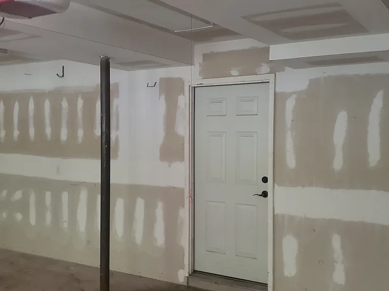 Back wall of garage to mechanical/storage area.