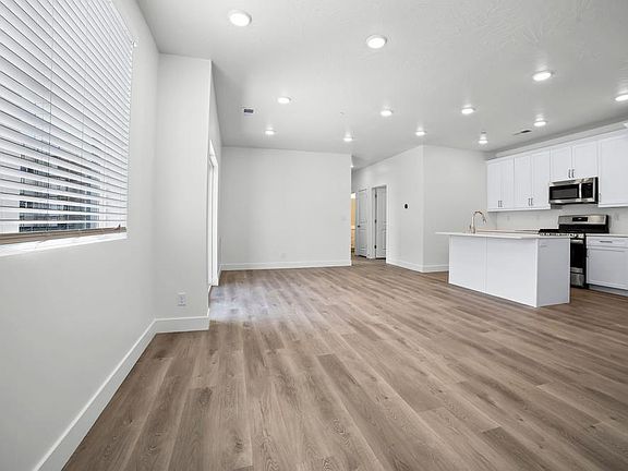 Great Room Kitchen Photo not representational of selections, only the floor plan. Contact agent f