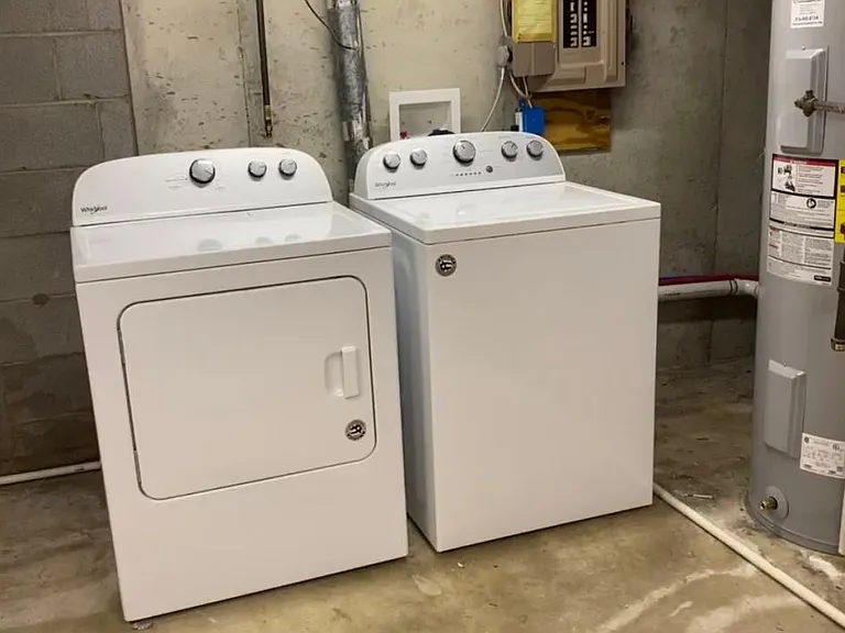 Washer and Dryer Provided in Basement area