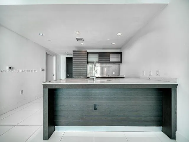 Epic West Condo — Photo 2