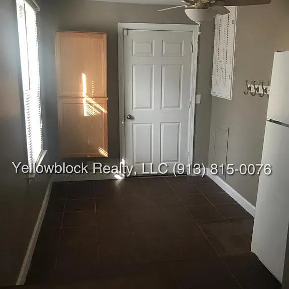 320 E 79th Ter — Photo 8
