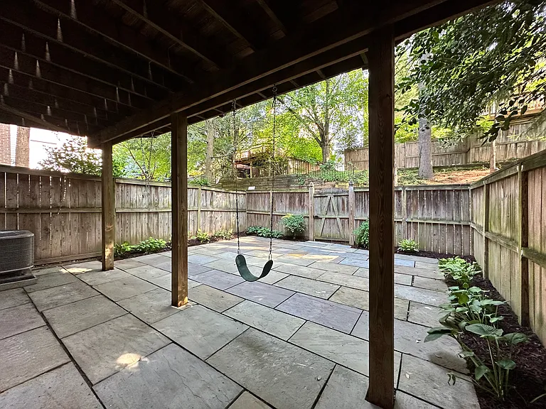 Fenced Backyard with Flagstone Patio