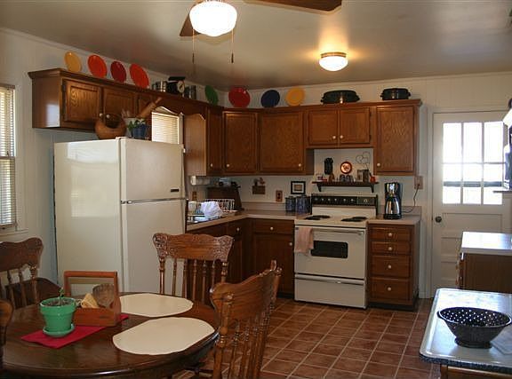 Great Eat-in kitchen with newer vinyl flooring.