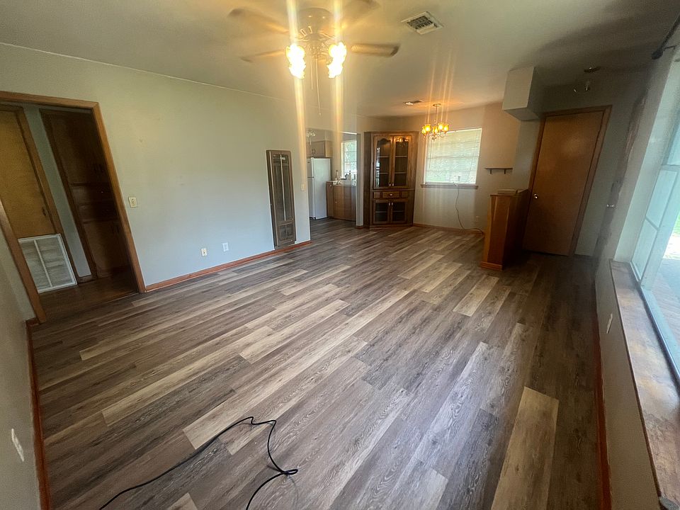 Living room, Entryway and Dining/ 
New Floors/New Paint