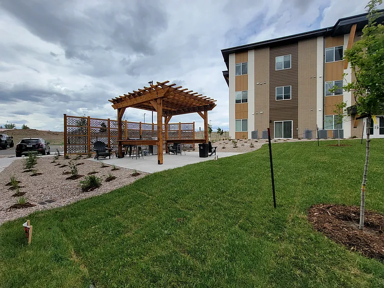 Phase I Courtyard with gas grill, pitboss smoker and (not pictured) gas fire pit.