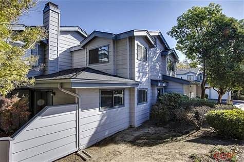 Corner unit showered in sunlight.