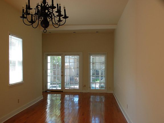 Living/Dining Room View.  Side Door on Left Side.