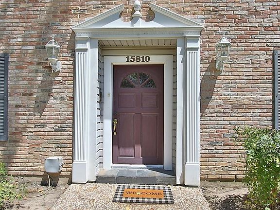 Welcome your guests with the charming woodwork around the front door.