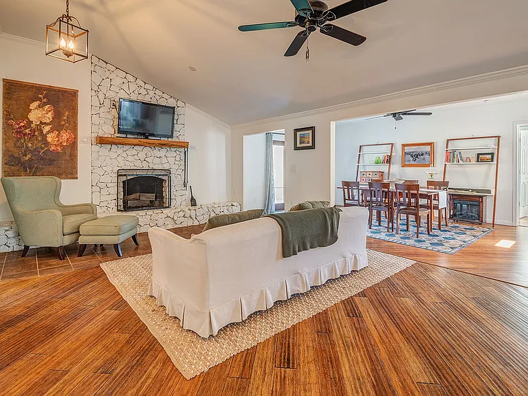 Living room opens to Dining area. Fireplace is INoperable