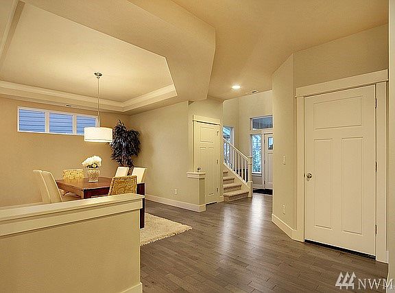 Photos are of the same home plan, but different finishes.