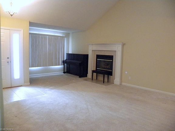Vaulted ceiling and gas fireplace in the living room