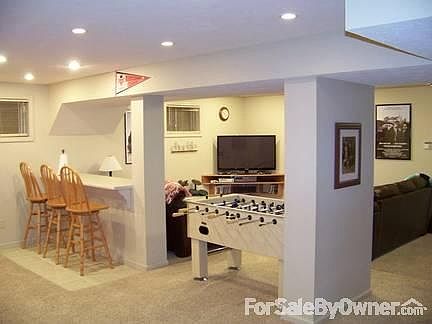 Bsmt w/ built-in bar, desk & TV stand