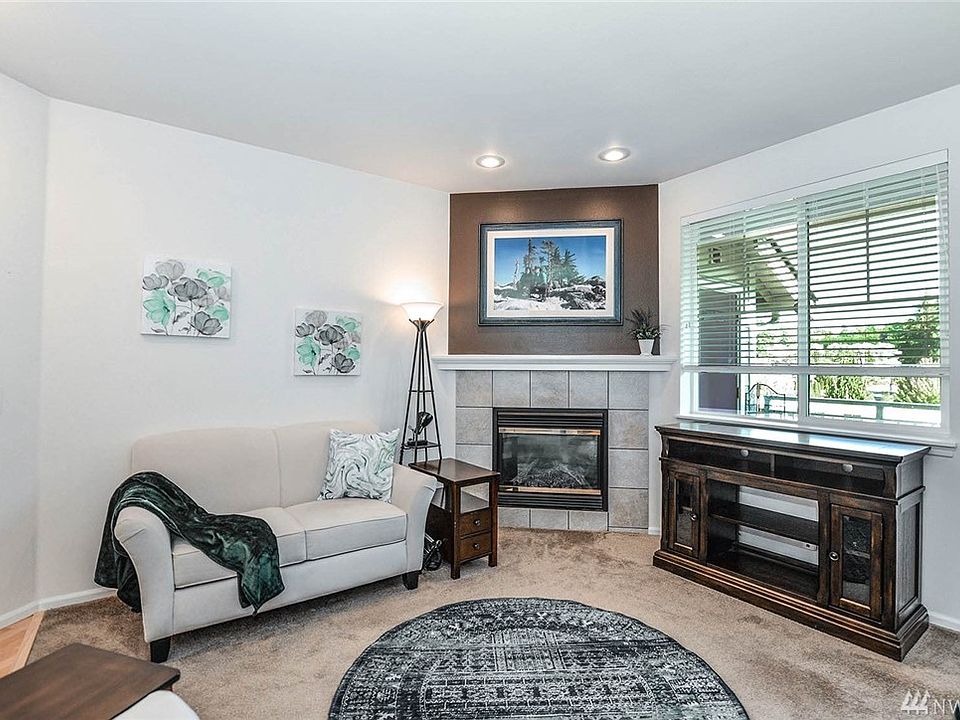 Main living area with vaulted ceilings and loads of natural light!