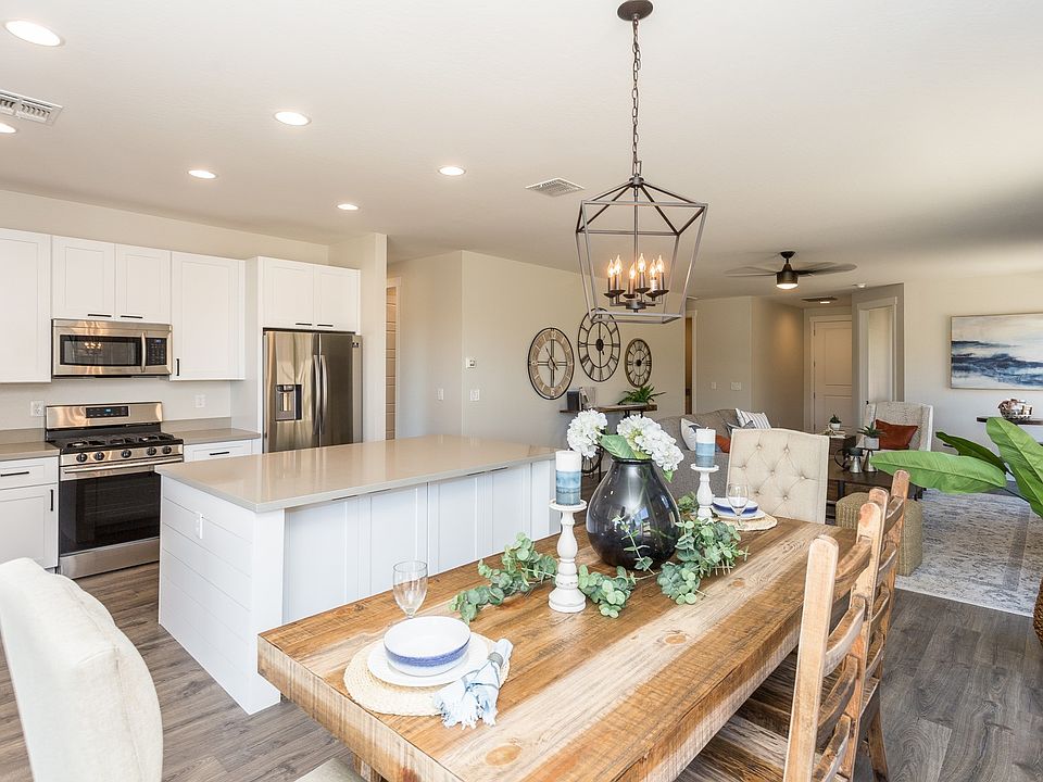 Kitchen Island features additional cabinets on the back side