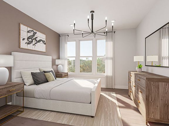 Owner s Suite with a Walk-in Closet and Private Bathroom