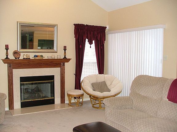 LR w/ FP and vaulted ceiling.
