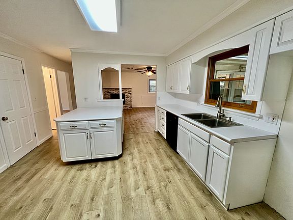 Large kitchen with dishwasher and new Mohawk hybrid resilient flooring