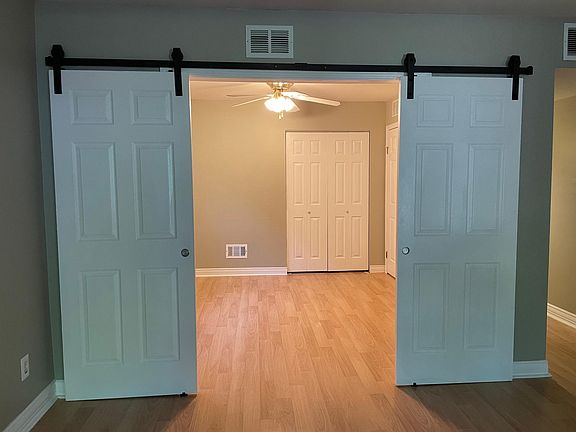 3rd Bedroom/Office with double barn doors facing living room