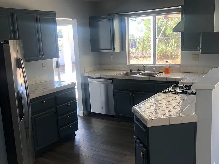 kitchen, gas range, dishwasher, in sink garbage disposal, refrigerator