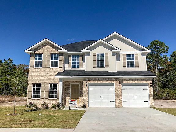 Kohen with vinyl brick front exterior