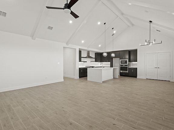 Great room with vaulted ceiling