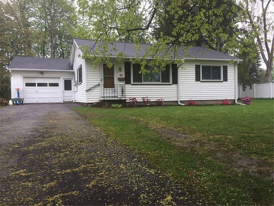 Quaint and cozy!  Welcome to 65 Peer Street, Honeoye Falls, NY.  (Exterior front.)