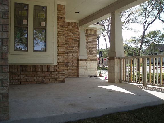Relax and visit with neighbors on the large front porch