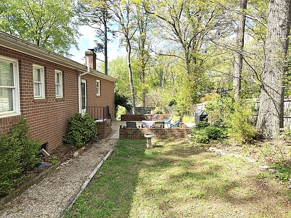 back yard view from corner. back yard is fully fenced in