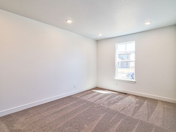Directly off the entrance is a private den, perfectly suited for an at home office.