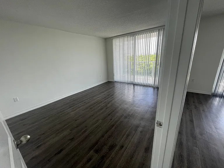 Guest bedroom with balcony access