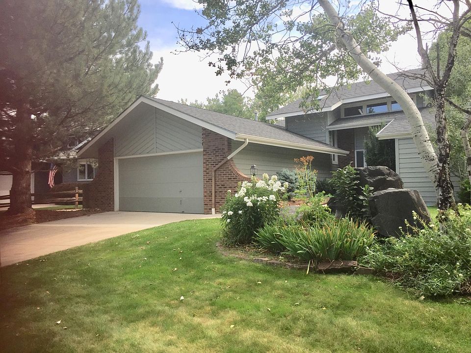 Front of House with Large 2-Car Garage on Bike Path