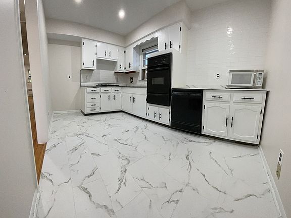 3rd image of 8412 Liberty Ave Floor 2