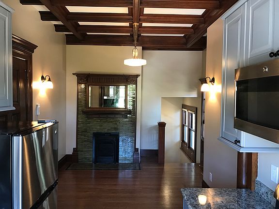 Original box ceiling detail and vintage light fixture