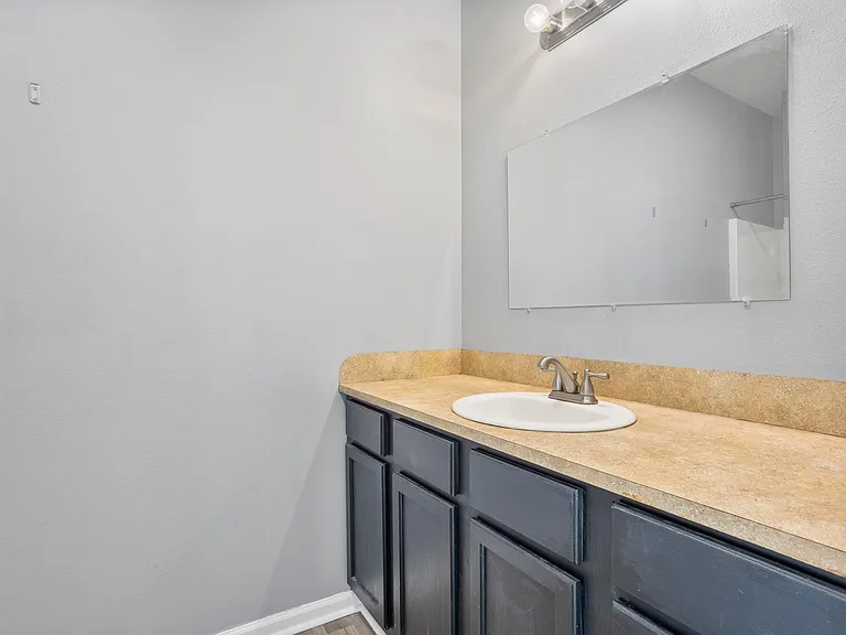 Master bathroom full length sink with plenty of counter space