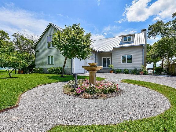 Beautifully updated, this 3/4 bedroom home has a professionally landscaped front yard that welcomes you home.