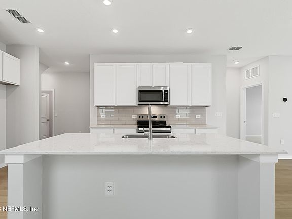 5th image of 14820 MACADEMIA Lane