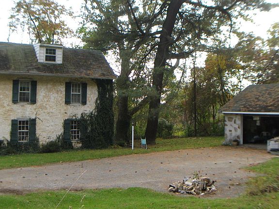 farmhouse with detatched garage