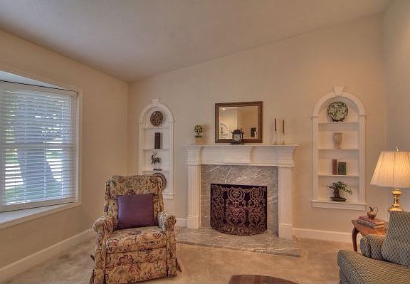 Lovely Tradiitional Fireplace with Marble Surround